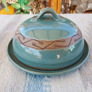 Hand made pottery covered plate